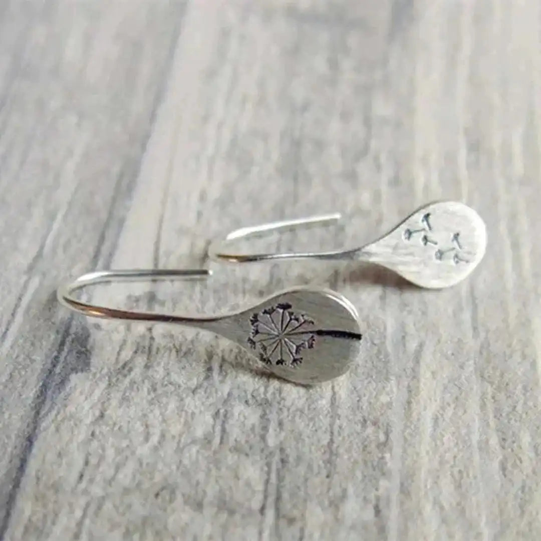 Boucles d'oreilles vintage en argent, délicatement sculptées en forme de fleur