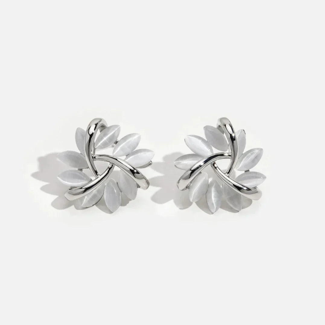 Boucles d’Oreilles Raffinées en Or et Argent Style Clous