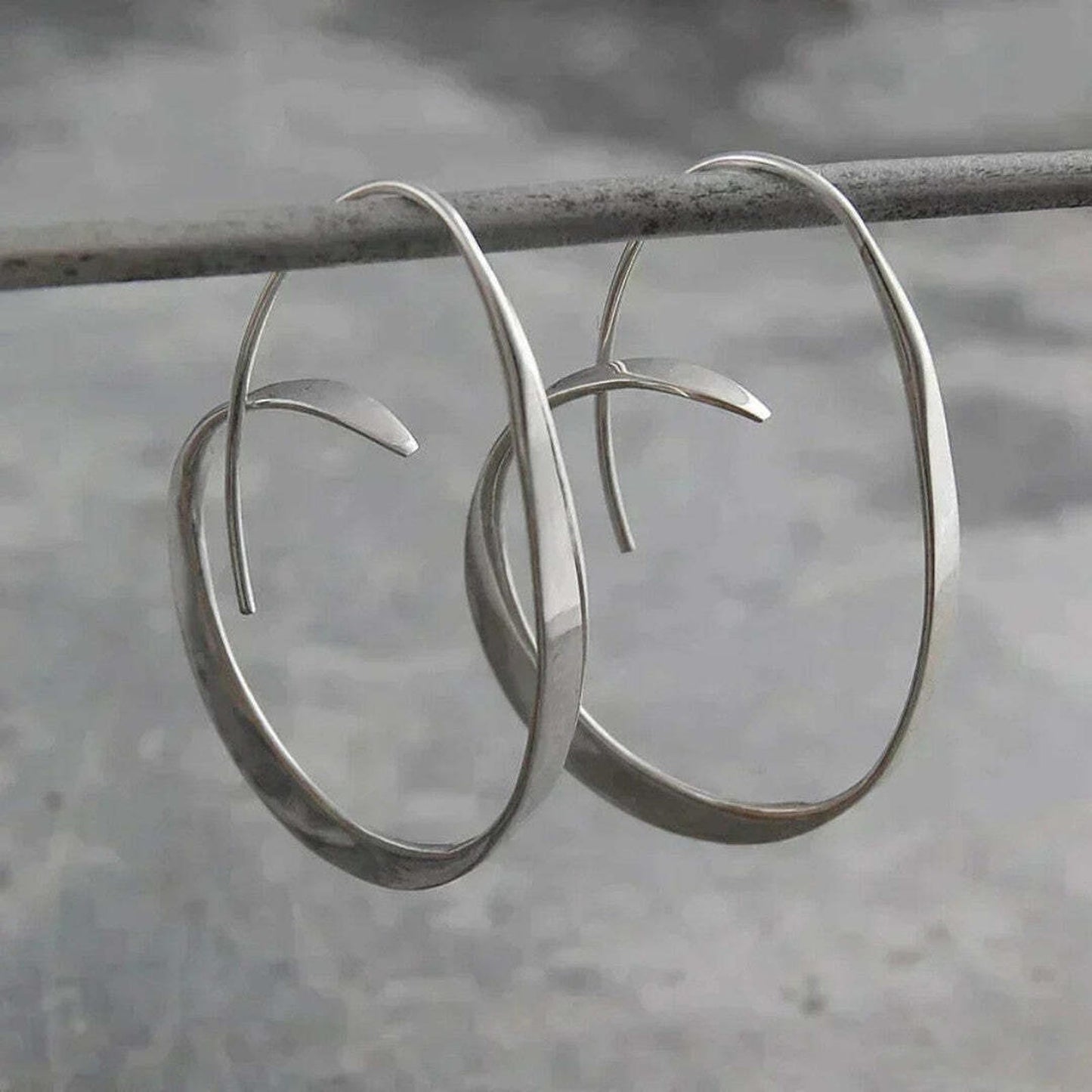 Boucles d'oreilles pendantes en spirale ouverte