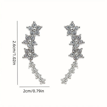 Des boucles d'oreilles fleuries intemporelles