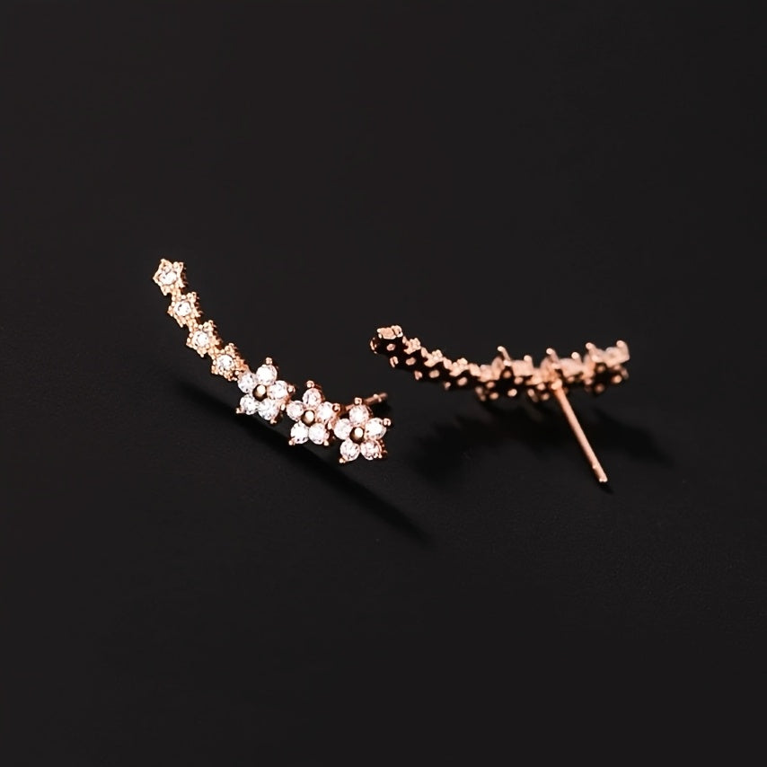 Des boucles d'oreilles fleuries intemporelles