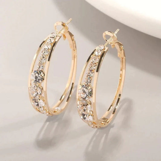Créoles en or ornées de paillettes élégantes