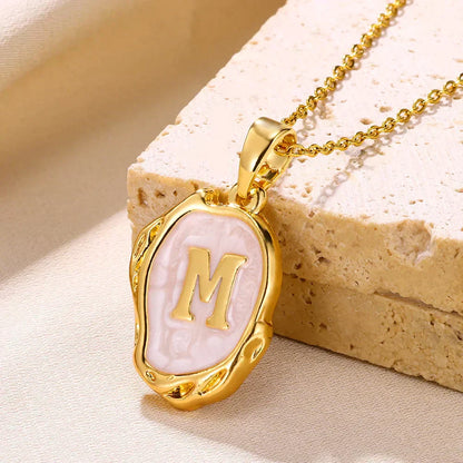Collier océan plaqué or 18 carats avec initiales au fond de la mer