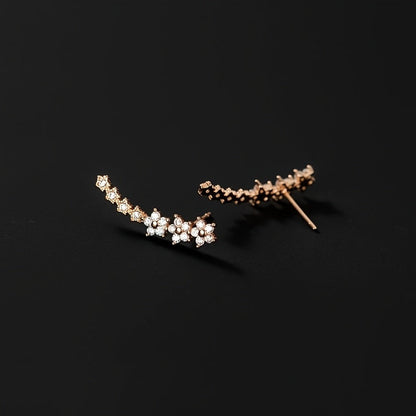 Des boucles d'oreilles fleuries intemporelles