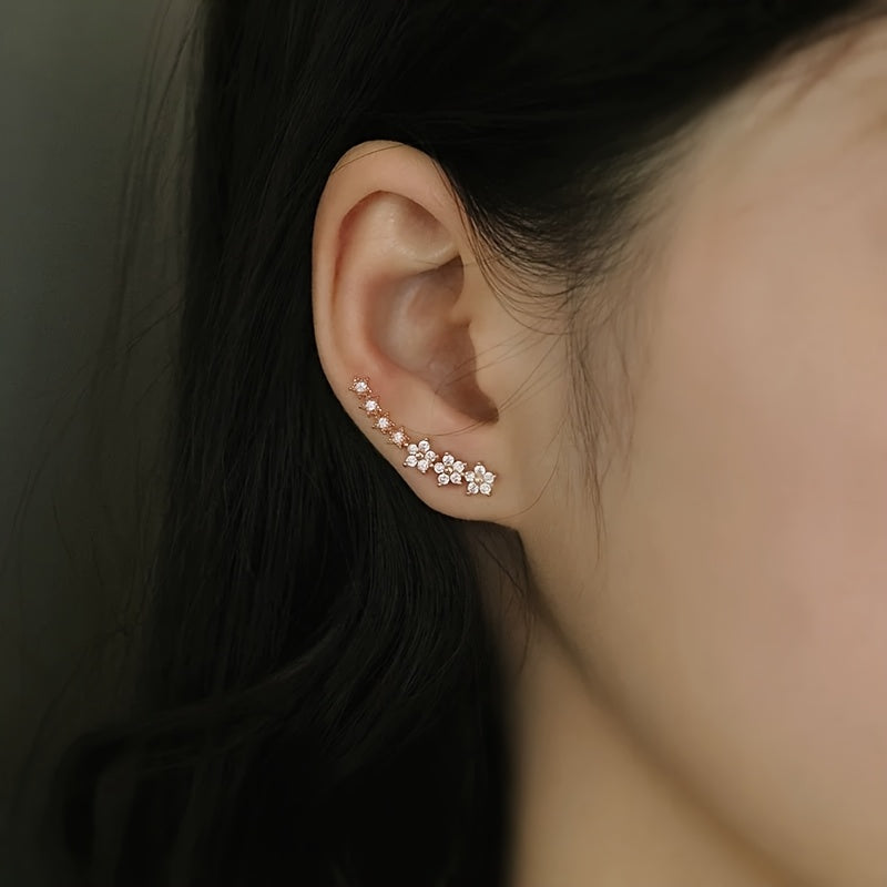 Des boucles d'oreilles fleuries intemporelles