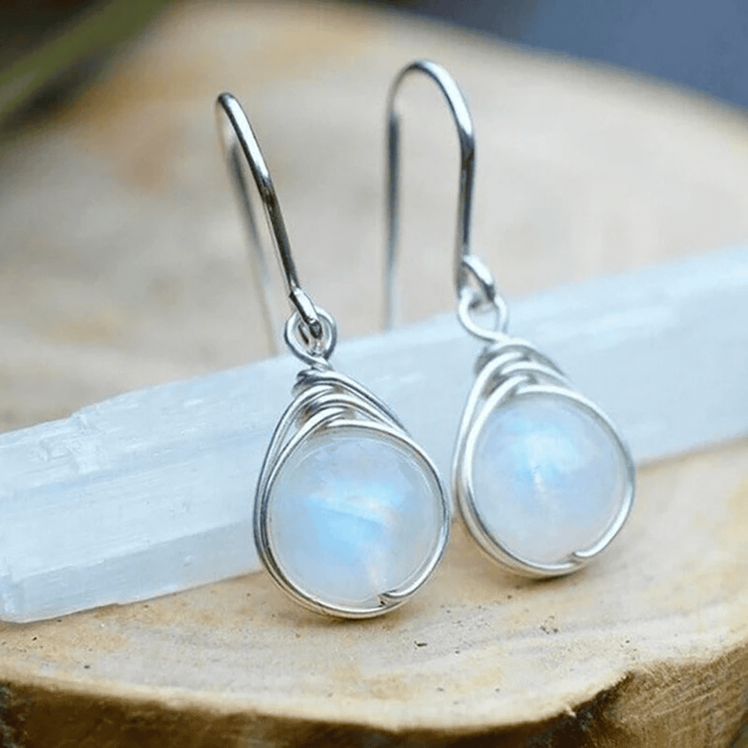 Boucles d'oreilles pendantes en argent et pierre de lune