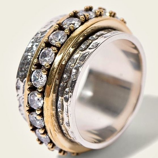 Bague vintage en or et argent ornée de zirconium