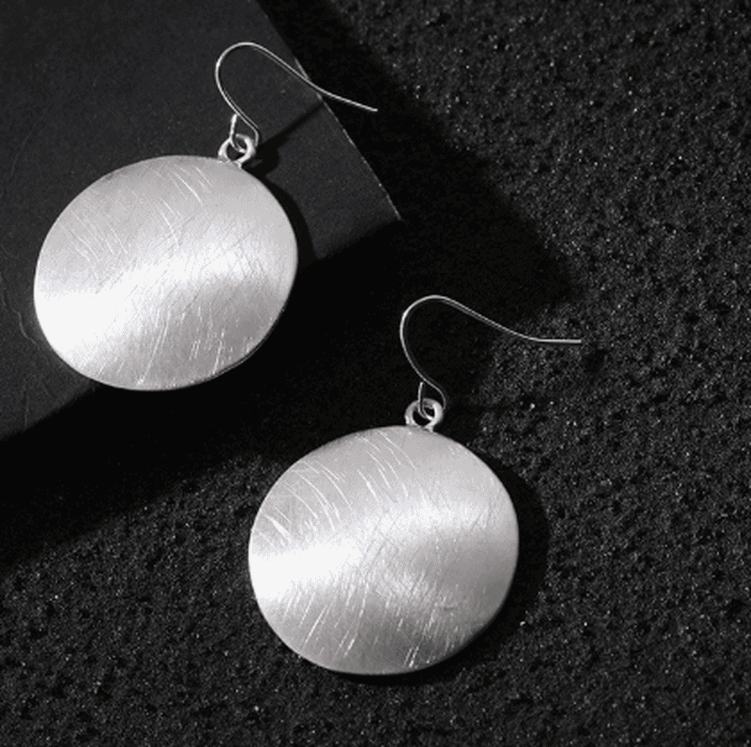 Boucles d'oreilles rétro en disque d'or