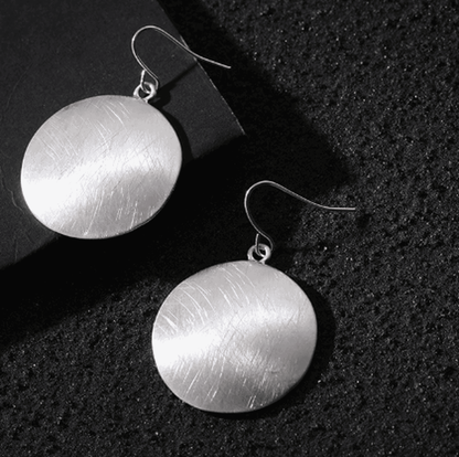 Boucles d'oreilles rétro en disque d'or